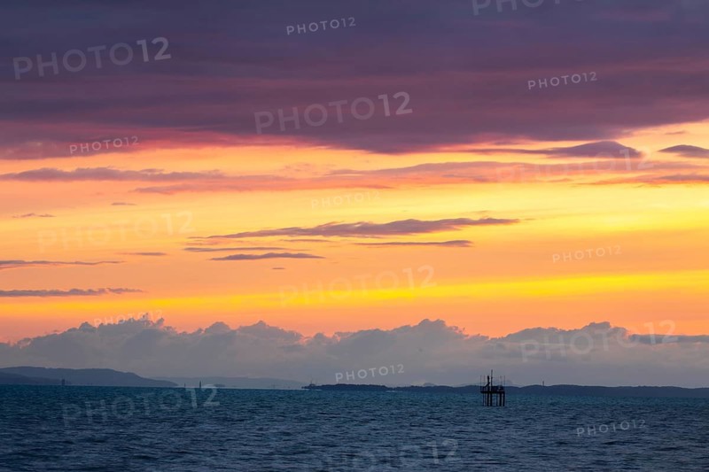 Sunset with thunderstorm atmosphere, clouds, water, summer, Langenargen, Baden-Württemberg, Germany, Europe