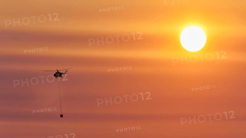 Helicopter, helicopter, fire-fighting helicopter, fire, sunball, sunset, Falassarna, West Crete, Crete, Greece, Europe