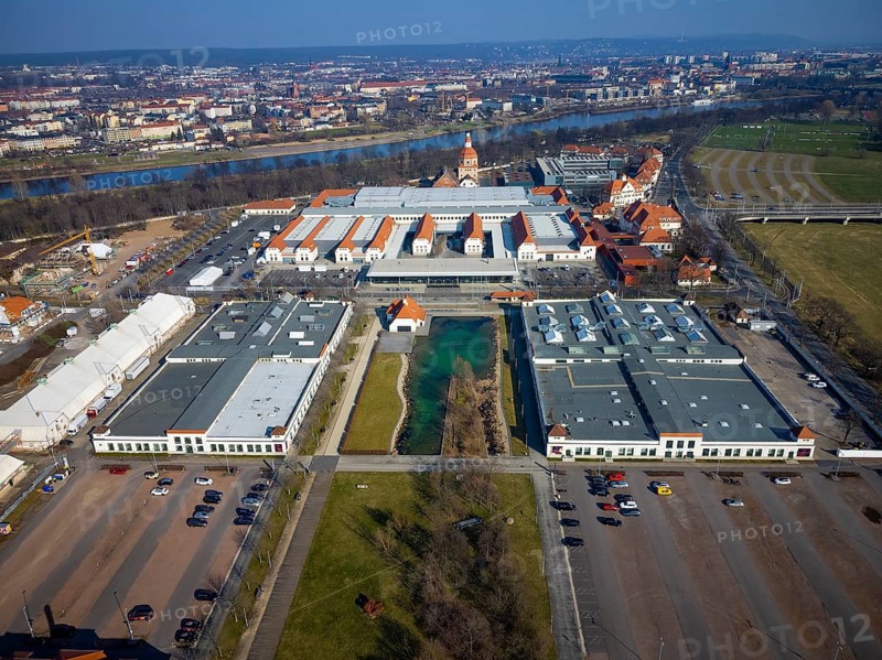 New Dresden Trade Fair Centre in the former Erlwein slaughterhouse.Dresden Sports High School on the right