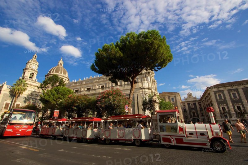 Super wide angle, cathedral, slow train, blue sky, white clouds, cathedral, Catania, old town, baroque old town, east coast, Sicily, Italy, Europe