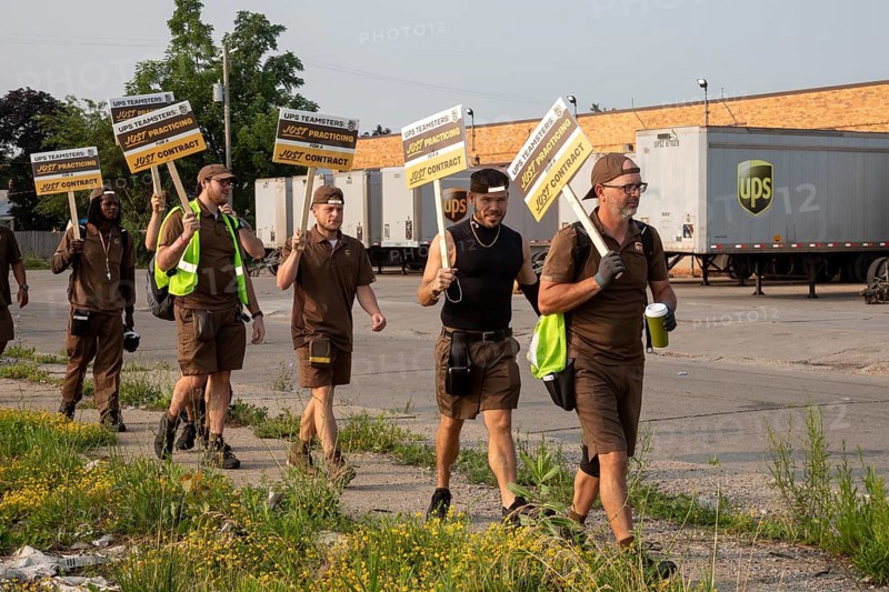 Detroit, Michigan USA, 30 June 2023, Members of the Teamsters Union carried just practicing picket signs at United Parcel Service's Cicotte terminal a month before the union's contract covering nearly 350, 000 workers expires.