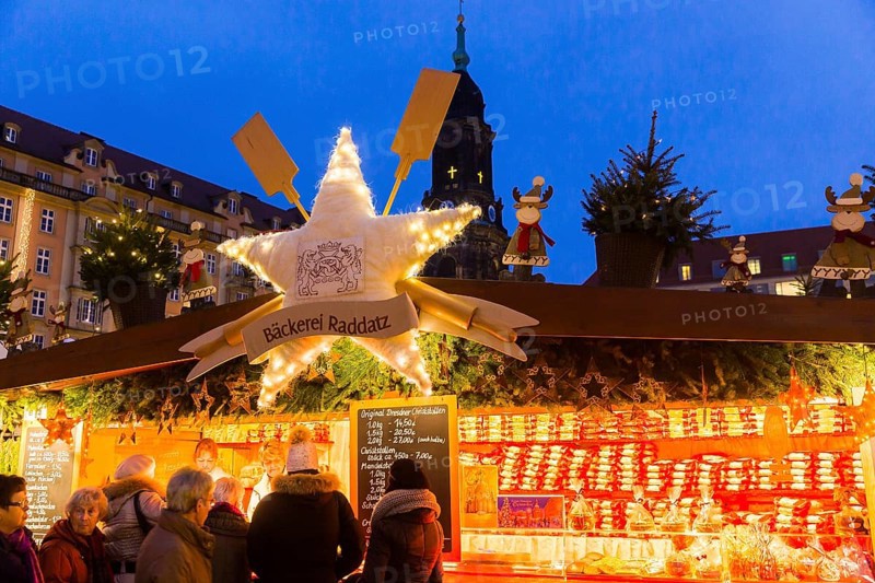 580th Striezelmarkt in Dresden Stollen sale by Raddatz Bakery. The Striezelmarkt, which has been held since 1434, is the oldest Christmas market in Germany and takes place on the Altmarkt. In 2009 the market was redesigned, a special landmark is for example the world's largest candle arch