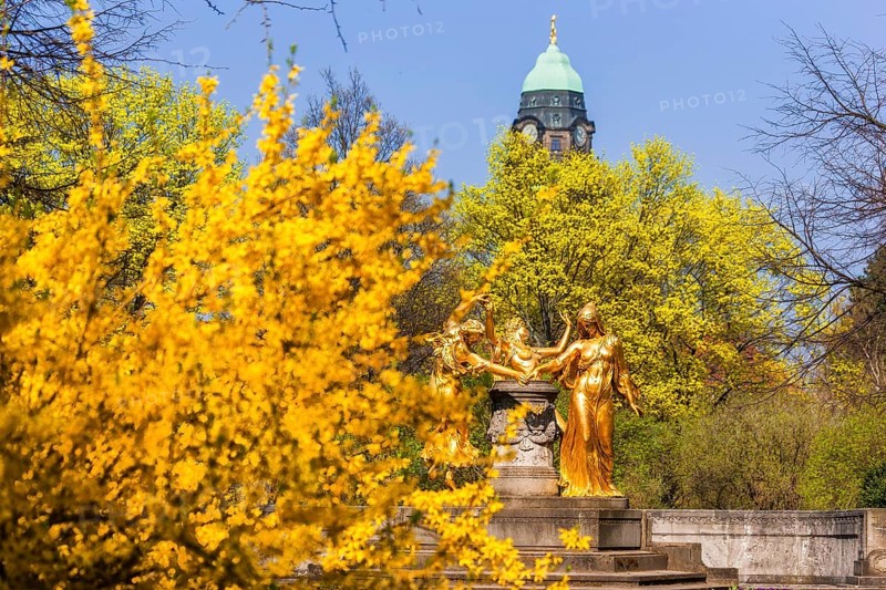 Bürgerwiese in Dresden in spring, Mozart Fountain with Town Hall Tower