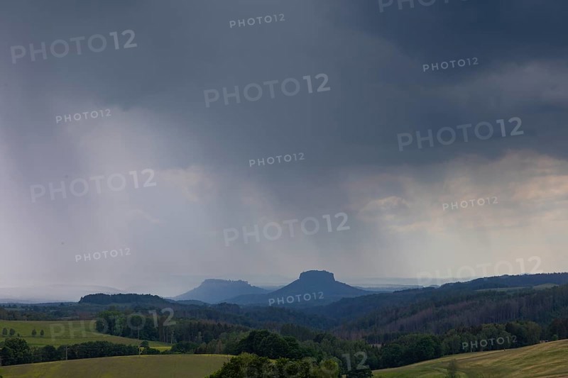 Thunderstorm in Saxon Switzerland seen from the Hochbuschaussicht in the direction of Lilienstein