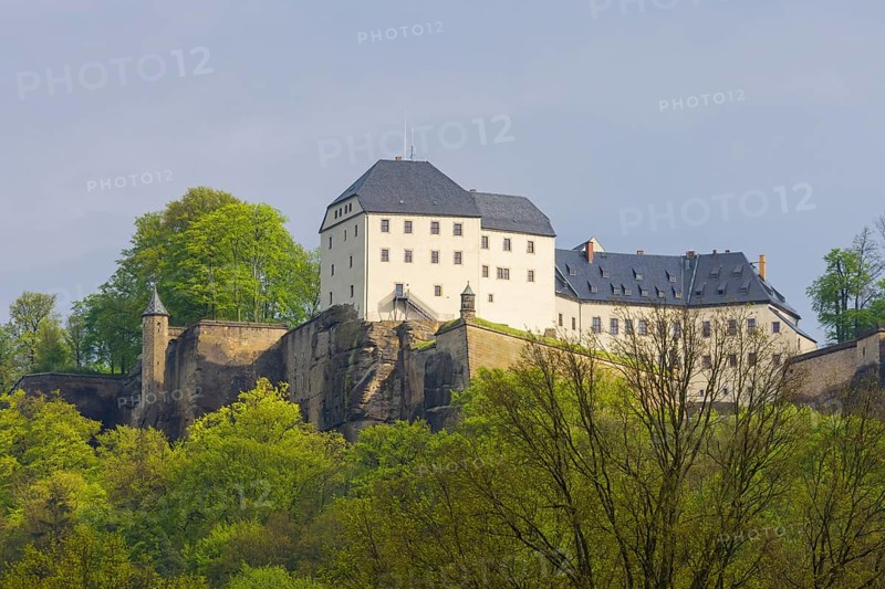 Königstein Fortress is one of the largest mountain fortresses in Europe and is located in the middle of the Elbe Sandstone Mountains on the table mountain of the same name above the town of Königstein on the left bank of the River Elbe in the district of Sächsische Schweiz-Osterzgebirge
