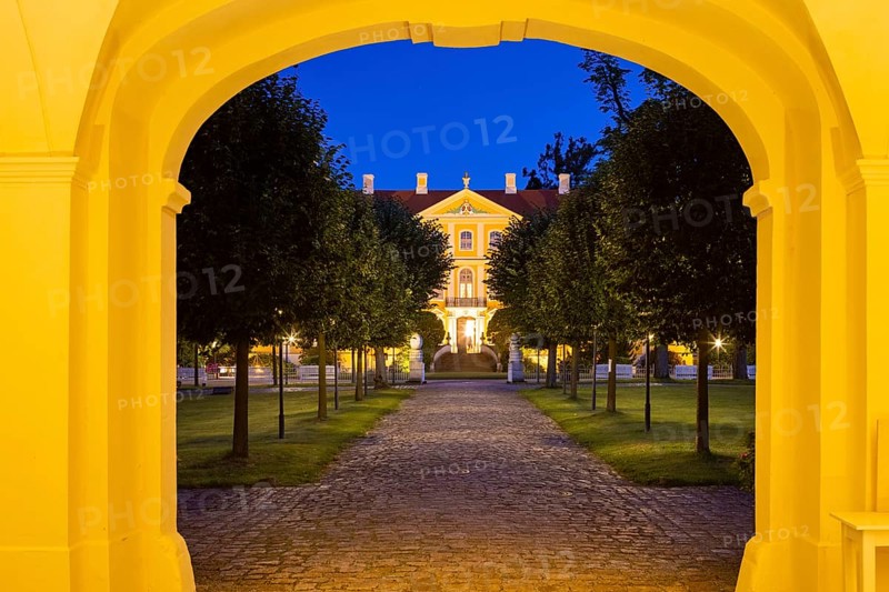 Baroque Rammenau Castle in Lusatia, on a summer evening. Rammenau Castle in Rammenau near Bischofswerda in the district of Bautzen is one of the best-preserved baroque country castles in Saxony. The grounds include the cour d'honneur, cavalier houses, manor house and park