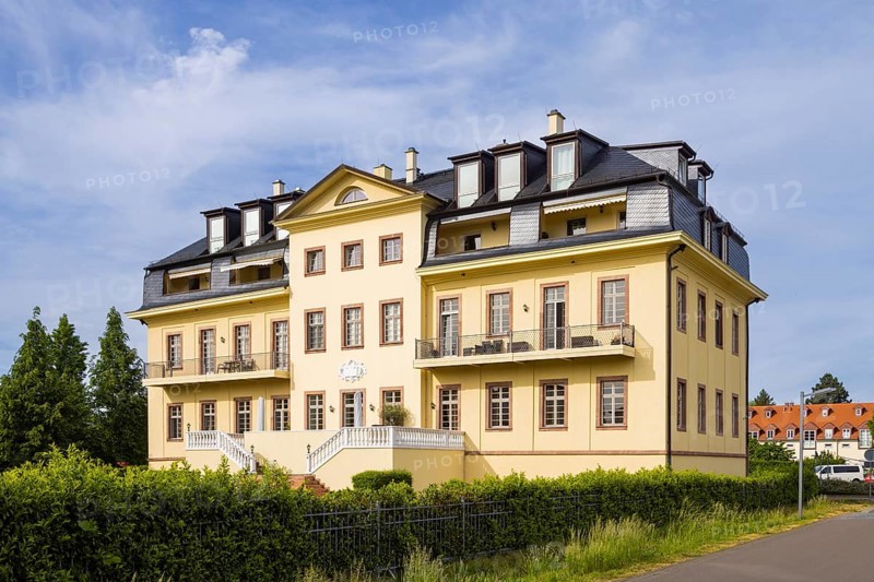 Zöbiker Castle on Lake Cospuden, now a residential building. Zöbigker Castle was built around 1700 by the von Marschall family as a three-storey building in the Dutch Baroque style with a double mansard hipped roof, in which three rows of dormers were placed one above the other lengthwise