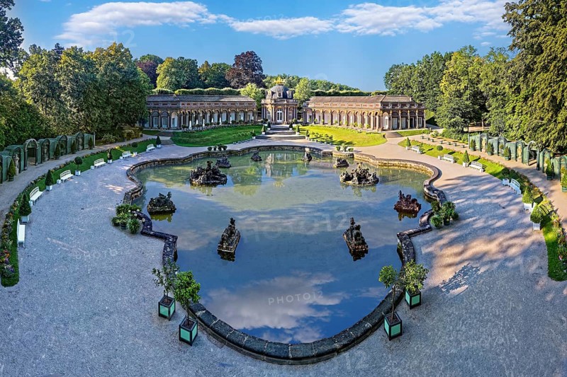 New Palace, orangery with central sun temple, circular buildings on both sides with arcade tract and golden quadriga on the roof, water basin in front of it Upper Grotto, Eremitage, historical park, park, garden, landscape park, Rococo, built from 1715, Eremitage district, Bayreuth, Upper Franconia, Franconia, Bavaria, Germany, Europe