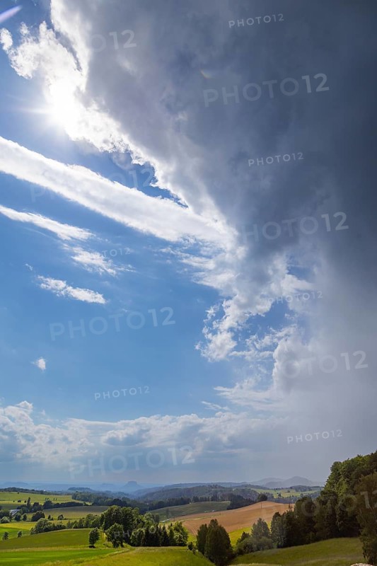 Thunderstorm in Saxon Switzerland seen from the Hochbuschaussicht in the direction of Lilienstein