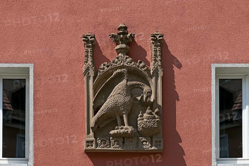 House sign, relief, eagle feeding its young in the nest, Bergstr. 13 ud 15, Nuremberg, Middle Franconia, Bavaria, Germany, Europe