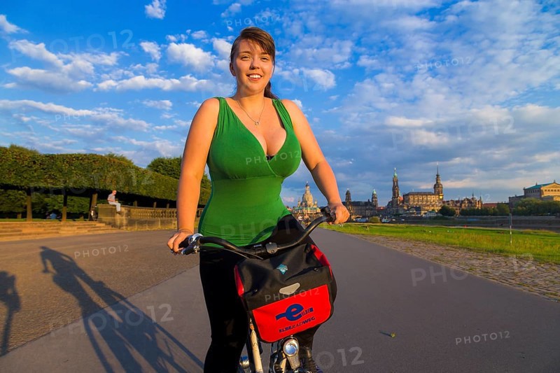 Young woman on the banks of the Elbe in Dresden