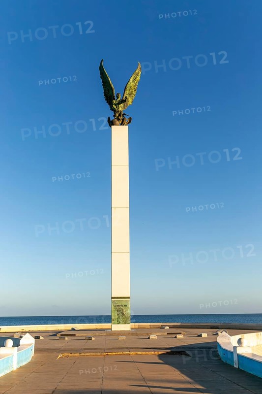 Sculpture of winged Mayan Angel on tall column, the seafront Malecon, Campeche city, Campeche State, Mexico, Central America