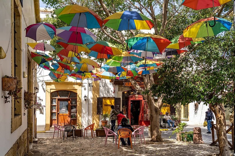 Cafe with colourful umbrellas in Kyrenia or Girne, Turkish Republic of Northern Cyprus