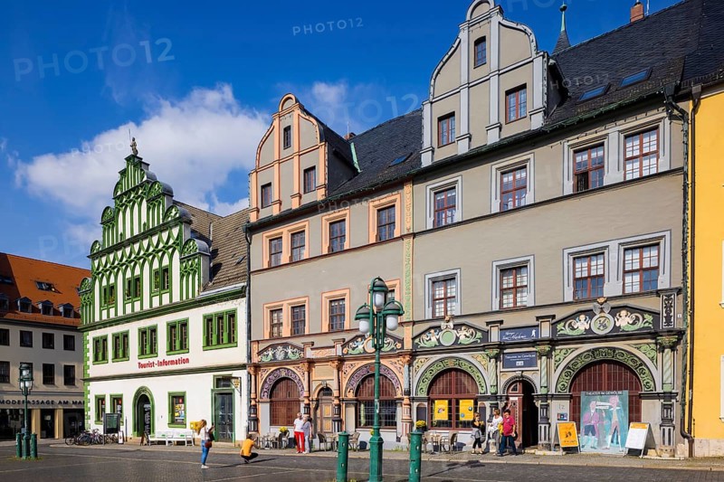 The square was given its distinctive shape in the 16th century by the town house and the semi-detached house to the east, the left half of which is now known as the Cranach House, the Court Pharmacy to the north and the inn Zum Schwarzen Bären to the south.In the centre of the market, the Neptune Fountain