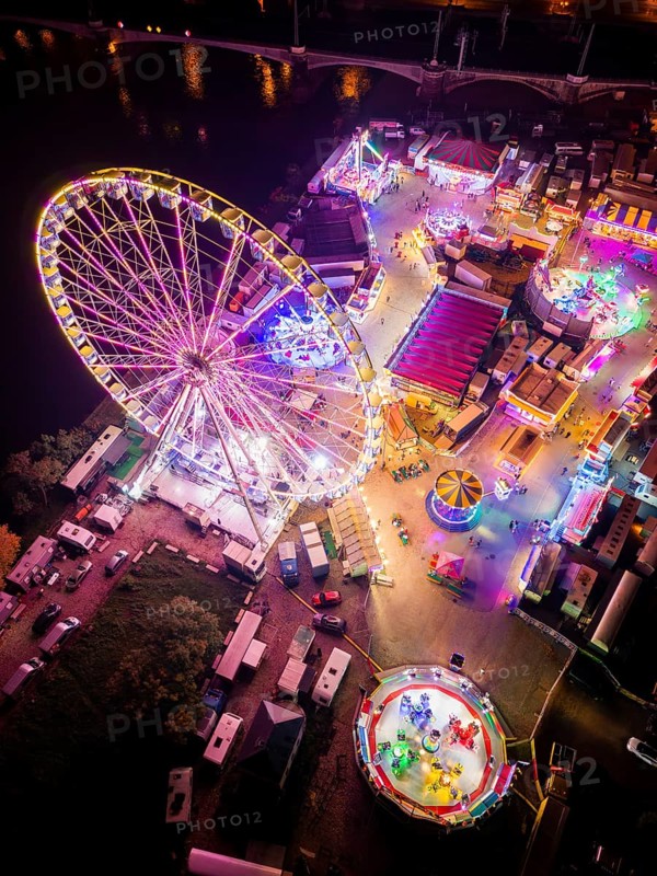 A 55m high illuminated Ferris wheel is the landmark of the fair at the Volksfest grounds on Pieschner Allee in Dresden