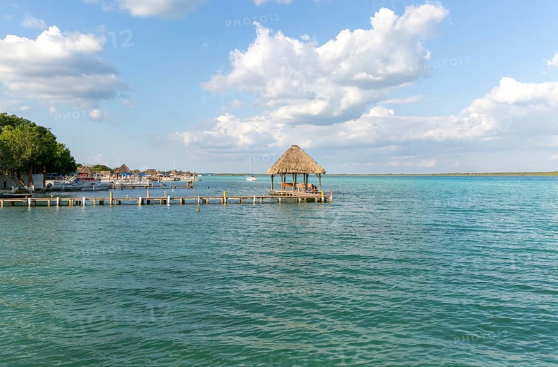 Cabana thatched cabin on wooden jetty Lake Bacalar, Bacalar, Quintana Roo, Yucatan Peninsula, Mexico, Central America