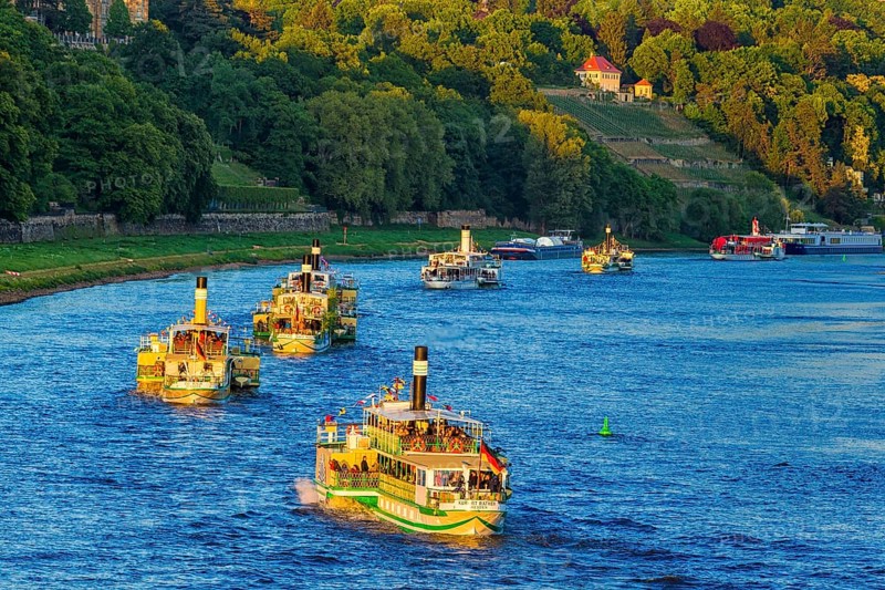DEU Saxony Dresden Since 1995, at the 25th International Dixieland Festival, steamers and saloon ships festively flagged over all tops left the mooring bridges on the Terrassenufer. Since then the RIVERBOAT-SHUFFLE with the world's largest fleet of paddle steamers has been one of the highlights of the festival