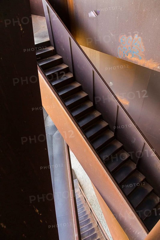 The Rusty Nail, a 30m high observation tower on the Sorno Canal, built of Corten steel. The name originated because the tower is covered with a reddish-brown patina