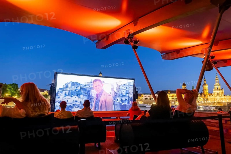 The Film Nights on the banks of the Elbe are Germany's largest open-air cinema festival. They have taken place every summer since 1991 on the Neustädter Elbufer in Dresden and have attracted over 200, 000 viewers in recent years. In 2021 the film nights will start with the Radeberger Fimnacht and 60 Years of Bond: No Time to Die