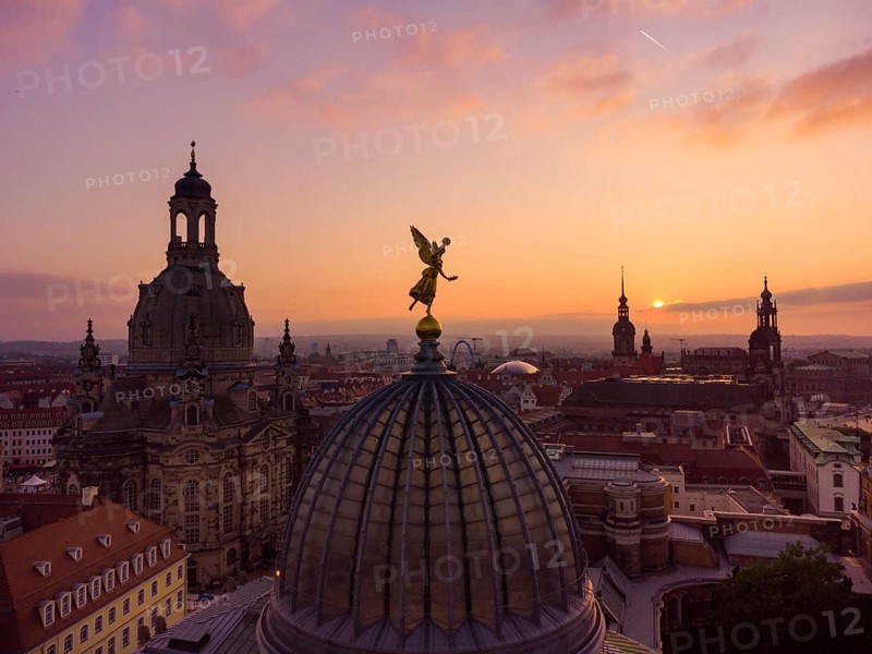 Dresden's old town from above.The glass dome of the Academy of Arts, crowned by a Fama figure, under which there is an exhibition room, called a lemon squeezer after its shape