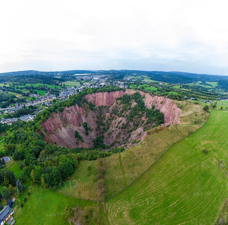 The Altenberger Pinge is a pinge in Altenberg in the Osterzgebirge that was created by tin mining. The main quarry occurred in 1620. At the beginning of the 19th century, the pinge had an area of only about 2.5 hectares. From around 1976 in particular, it was considerably expanded through intensive ore mining