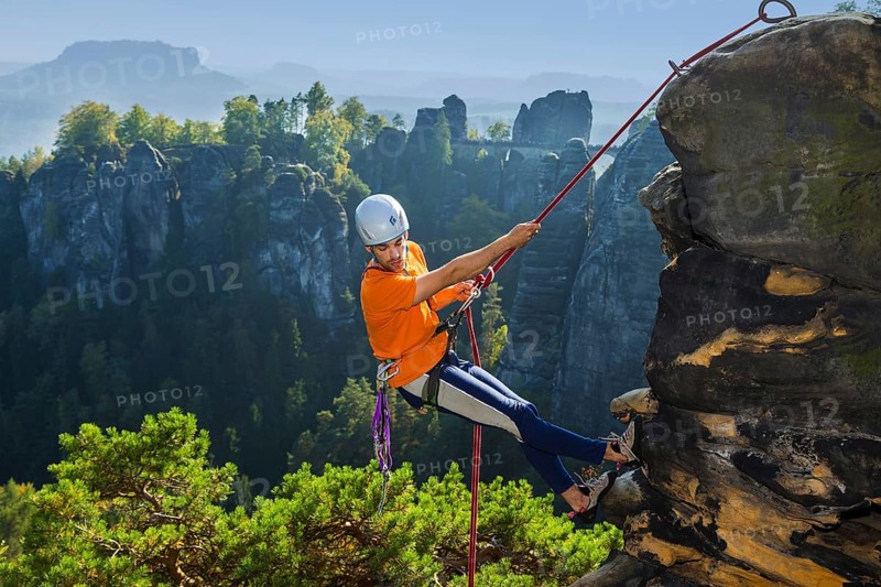 Climbers in Rathen in Saxon Switzerland