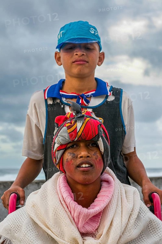Two dark skinned, sceptical teenagers. San Antao. Cabo Verde. Africa