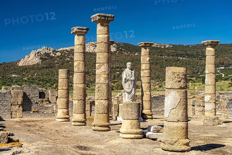 Trajan statue and basilica of the Roman ruins of Baelo Claudia in Bolonia, Tarifa, Costa de la Luz, Andalucia, Spain, Europe