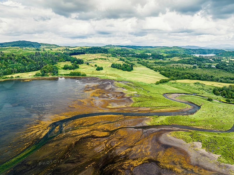 Loch Feochan and Feochan Bheag River from a drone, Feochan Glen, Oban, Argyll and Bute, West Highlands, Scotland, UK