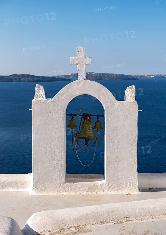 Whitewashed belfry wiith view of caldera and sea, Ia, Oia, Santorini, Greece, Europe