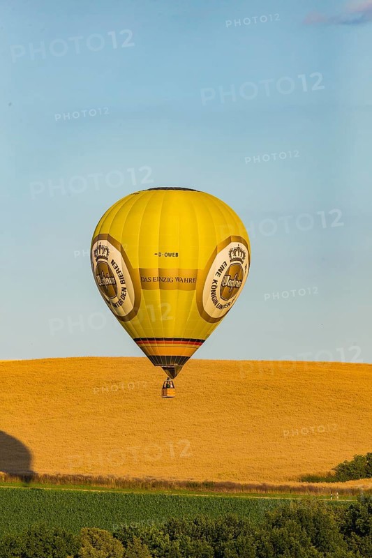 Summer balloon flight over the foothills of the Osterzgebirge mountains