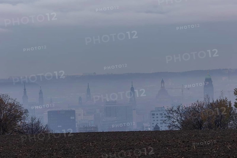 View from Dresden's Südhöhe of the city centre with its towers sinking into the fog