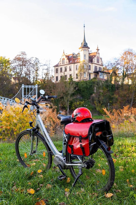 Symbolic image Resting on an e-bike tour in the Leipzig region in Grimma at the Mulde bridge