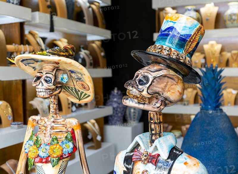 Ceramic skull and bones death artwork pieces inside gallery shop, Calzado Calle de los Frailes, Valladolid, Yucatan, Mexico, Central America