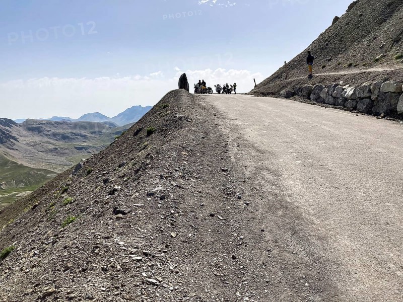 View of highest point of 2802 metres high asphalted paved alpine road mountain road alpine road above around Cime de la Bonette next to mountain pass Col de la Bonette, Route de la Bonette, National Park Mercantour, Jausiers, Departement Alpes-de-Haute-Provence, France, Europe