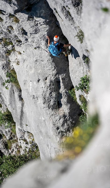 Climber on the rope, multi-pitch climbing, Via la Bellezza della Venere climbing tour, Garda Mountains, Arco, Trentino-Alto Adige, Italy, Europe