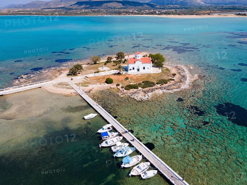 Drone shot, Saint Spiridon Greek Orthodox Church, Agios Spyridon, Elafonisos town, Elafonisos, Deer Island, Laconia, Peloponnese, Ionian Islands, Ionian Sea, Greece, Europe