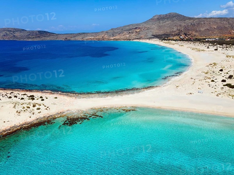 Drone shot, double bay of Simos beach, Sarakiniko beach, Elafonisos, Deer Island, Laconia, Peloponnese, Ionian Islands, Ionian Sea, Greece, Europe