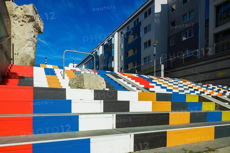 The staircase was designed by the Chemnitz initiative Die Buntmacher*innen. They won a prize for their idea in the Nimm Platz (Take a Seat) competition, which Chemnitz announced as part of its application for the European Capital of Culture in 2025. With the prize money of 2, 025 euros, the Buntmacher*innen were able to realise their idea