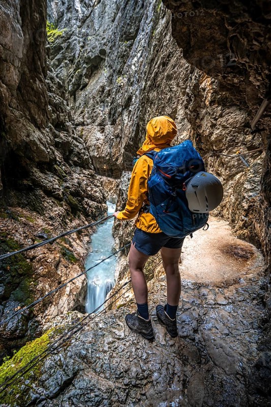 Hiker in a gorge, Hammersbach flows through Höllentalklamm, near Garmisch-Partenkirchen, Werdenfelser Land, Upper Bavaria, Bavaria, Germany, Europe