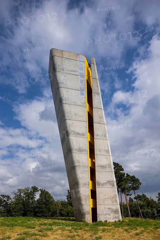 The site where the sky disc was found is about three kilometres from the Nebra Ark Visitor Centre on the Mittelberg plateau. There, a 30-metre-high tower tilted at an angle of 10Â° is directed towards the site along the north-south axis, like the hand of an oversized sundial