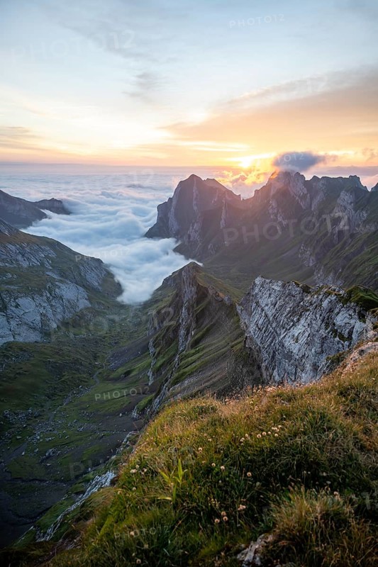 View over Säntis mountains into the valley of Meglisalp at sunrise, high fog in the valley, Säntis, Appenzell Ausserrhoden, Appenzell Alps, Switzerland, Europe