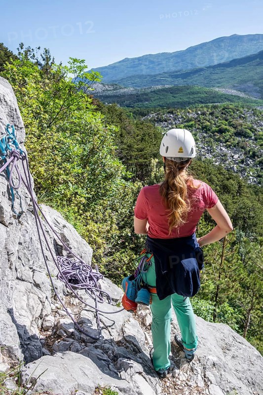 Climber on the rope, multi-pitch climbing, Via la Bellezza della Venere climbing tour, Garda Mountains, Arco, Trentino-Alto Adige, Italy, Europe