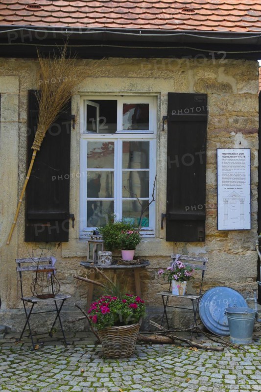 Gomaringen Castle, former bakehouse and washhouse, prison in the castle courtyard, Gustav Schwab Museum, historical building, architecture, small house, windows, shutters, washing utensils, brooms, information board, chairs, still life, plants, Gomaringen, Baden-Württemberg, Germany, Europe