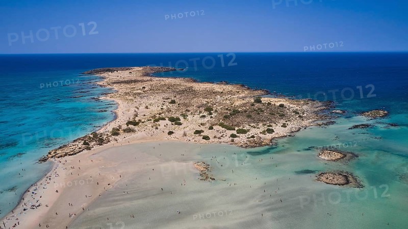 Overtourism, Tourists on the beach, Sunshades, A sandy headland jutting out into the sea, surrounded by clear water and beaches, Elafonissi, Lagoon, Southwestern tip of Crete, Crete, Greek Islands, Greece, Europe