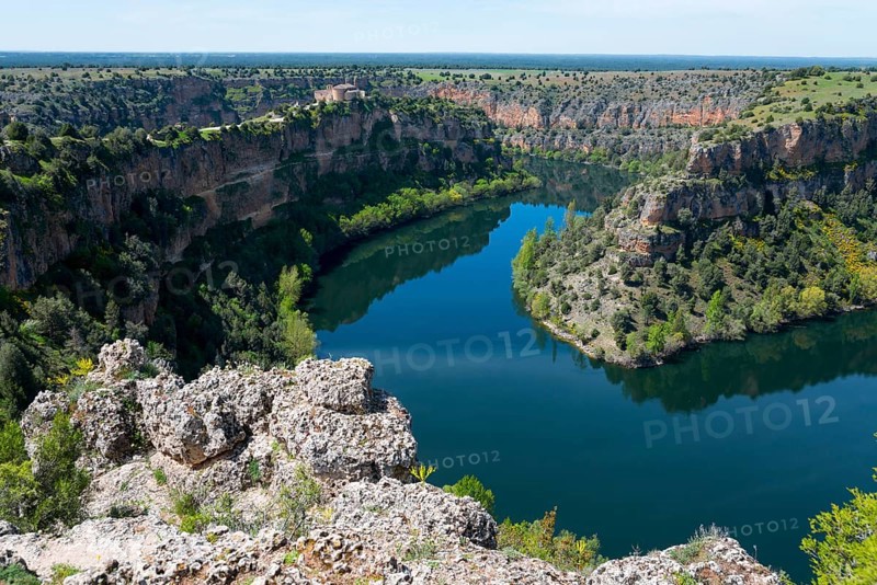A winding river flowing through a beautiful, rocky gorge lined with lush vegetation and steep cliffs, gorge, Duratón River Gorges Natural Park, Duraton, Parque Natural de las Hoces del Río Duratón, Sepulveda, Segovia, Valladolid, Castilla y León, Spain, Europe
