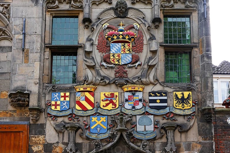 Historic city centre of Delft, Gemeenlandshuis van Delfland, magnificent portal with coat of arms, oldest stone-built house in Delft, town hall in late Gothic style, Delft, South Holland, Netherlands