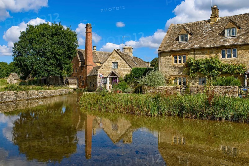 Old water mill in Lower Slaughter, a village in Cotswolds area, England, UK