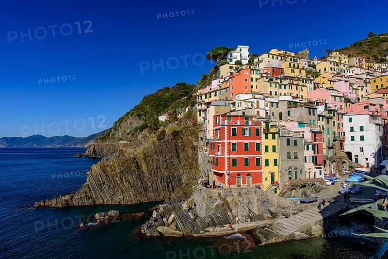Riomaggiore, one of the five Mediterranean villages in Cinque Terre, Italy, famous for its colorful houses, Europe