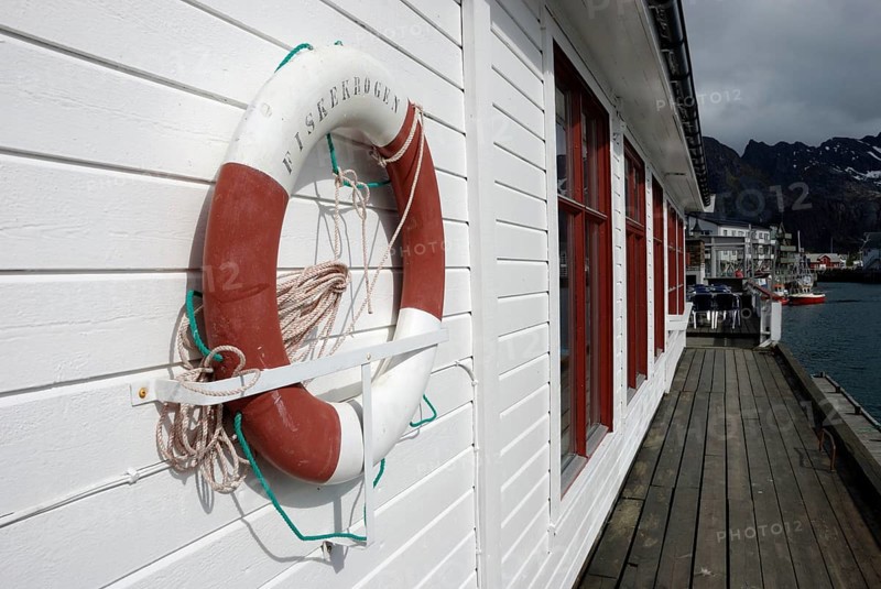 Lifebuoy at the harbour in Henningsvär, Austvagöy, Lofoten, Norway, Europe